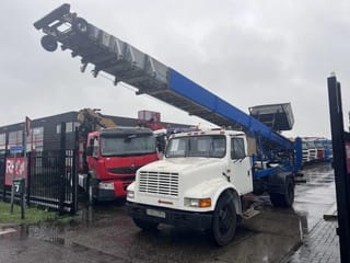 International 4x2 210HP + TEUPEN hyLIFT - Image 1